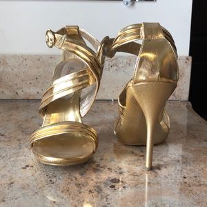Gold strappy heels